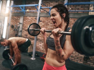 fit-couple-lifting-barbells-in-the-gym-ZACL9S6.jpg